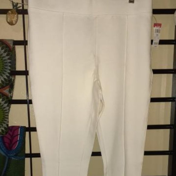 Attention Pants - large cream colored pants.